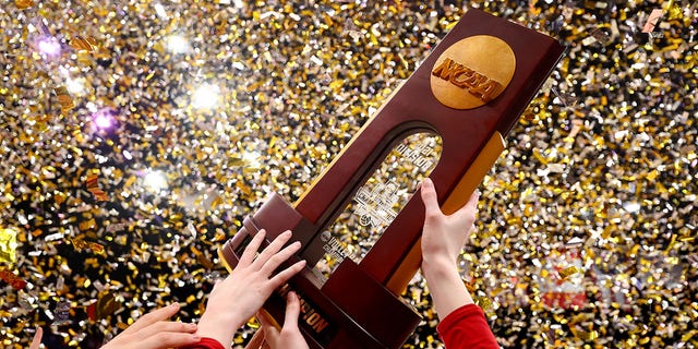 The Wisconsin Badgers celebrate after defeating the Nebraska Cornhuskers during the Division I Women's Volleyball Championship on December 18, 2021, in Columbus, Ohio. 
