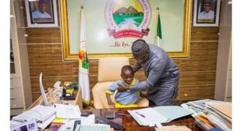 Fayemi steps aside for 7-Year-old boy to sit as governor of Ekiti State (Photos)