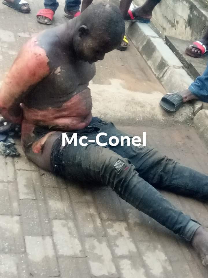 BREAKING: Angry mob sets man ablaze for trying to snatch phones from students in Benue