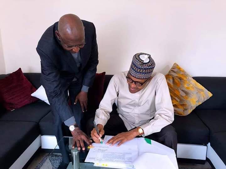 Buhari signs amended deep offshore act in London