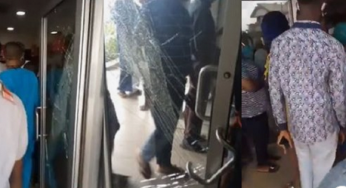 Customers break down door while struggling to gain access into GTBank in Ogba, Lagos (Video)