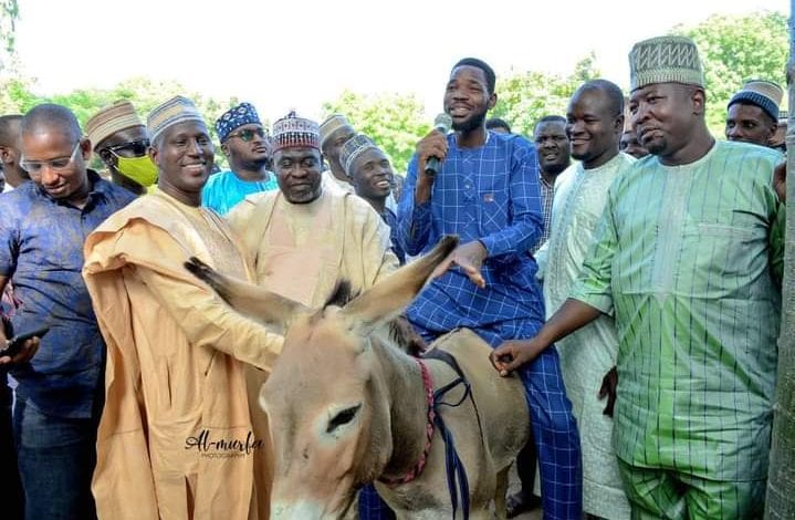 Kano: Gov Ganduje’s Aide shares Donkey to empower youths