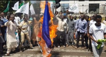 Shi’ites set French flag ablaze in Abuja over Macron’s ‘controversial’ comment