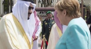 BBC under attack for publishing photo of Saudi King shaking hands with Germany’s Angela Merkel