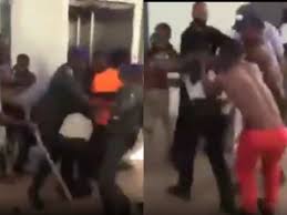 Drama as disabled men beat up security man at the National Assembly (VIDEO)