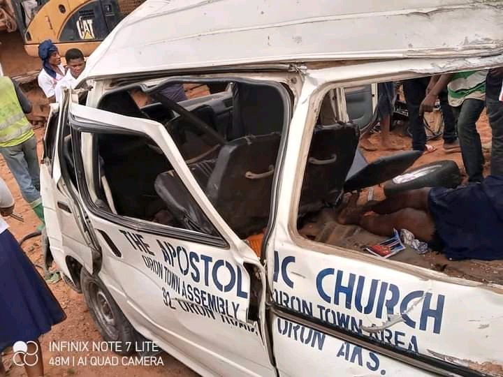 2 killed, many injured as Apostolic church bus rams into bulldozer in Akwa Ibom (Photos)