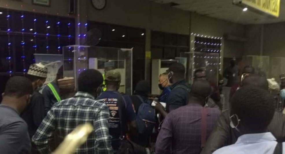 Drama at Kano airport as passengers, Azman airline staff exchange blows over fight cancellation