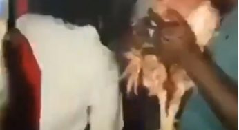 Suspected Yahoo Boys captured eating live chicken while be fortified by ‘native doctor’ (Video)