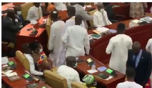 Drama as female lawmaker seats on male colleague’s laps as they fight over seats 