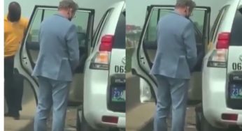 Reactions as diplomat spotted peeing on the road in Nigeria