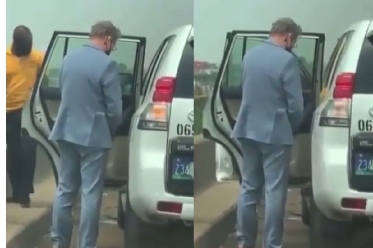 Reactions as diplomat spotted peeing on the road in Nigeria