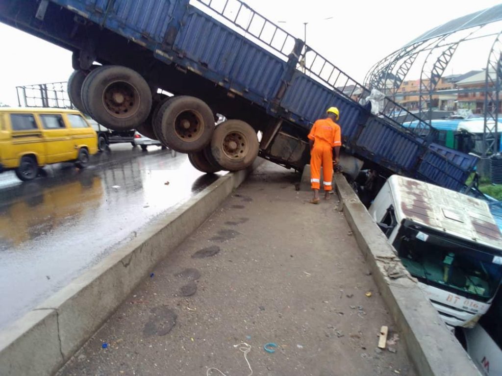 Death averted as truck falls off Oshodi Bridge