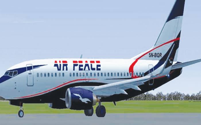 Dayo Adeneye locked in inside Air Peace lavatory, blasts airline