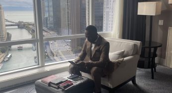 Dr. Paul Enenche pictured working from 20th floor of Trump Towers in Chicago