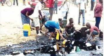 Residents scoop fuel as petrol tanker falls along lagos-Ibadan expressway