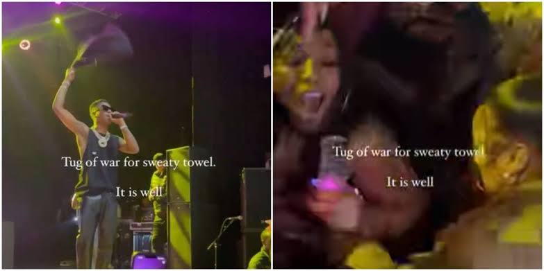 Drama as ladies fight dirty over Wizkid’s sweaty towel during concert (Video)