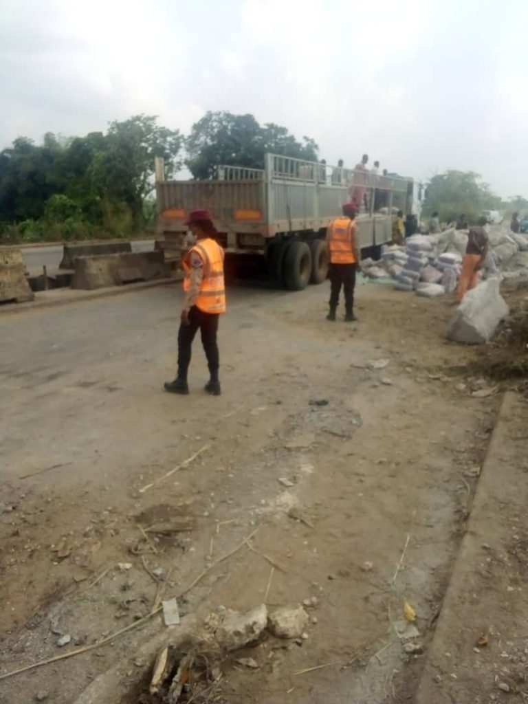 Tragedy as Dangote cement truck plunges into river in Ogun, one dead