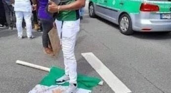 Not Peter Obi’s son, identity of man who stood on Nigeria flag revealed (Photos)