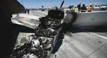 Plane crashes into truck, catches fire