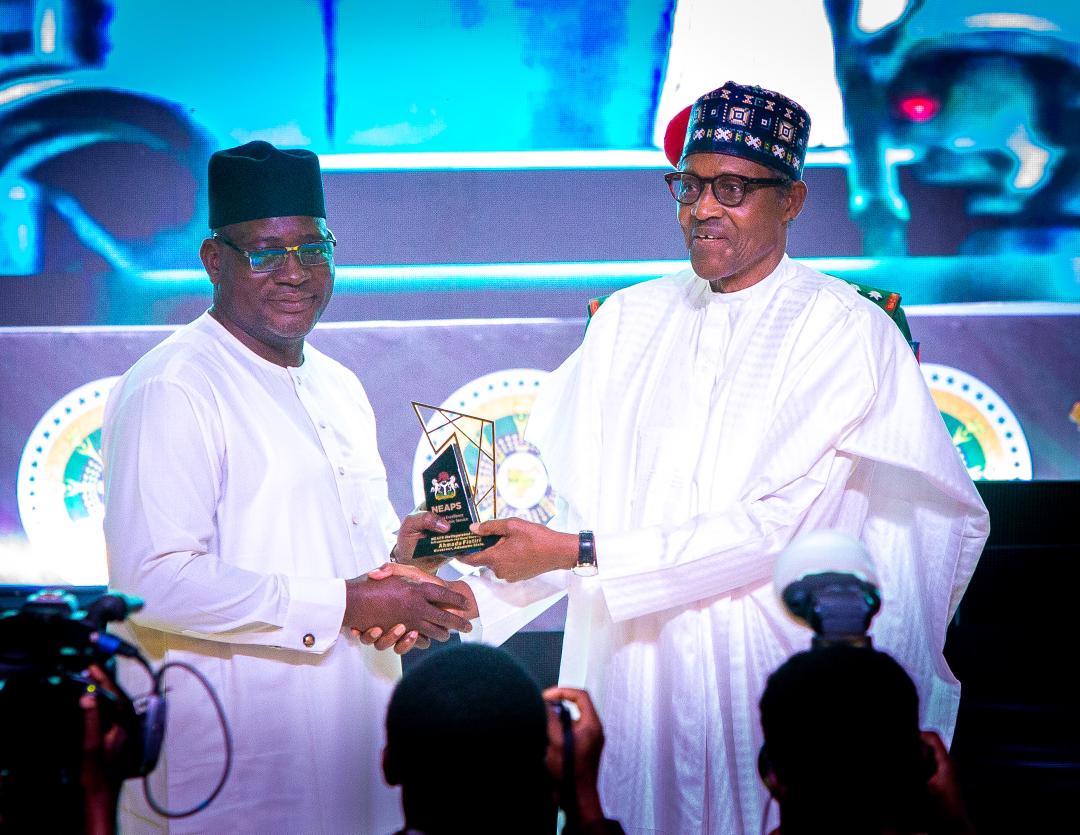 Excellence in fiscal reforms: President Buhari confers public service award to FIRS boss, Muhammad Nami