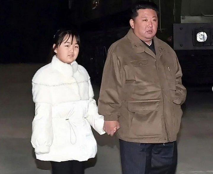 Kim Jong Un steps out with daughter for missile launch