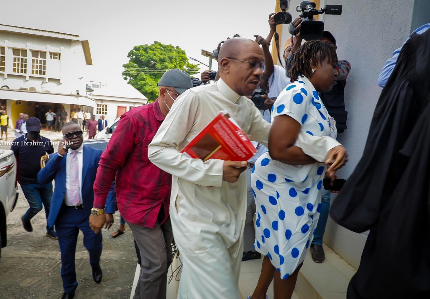 Drama as Godwin Emefiele arrives court with bible ( Photos)