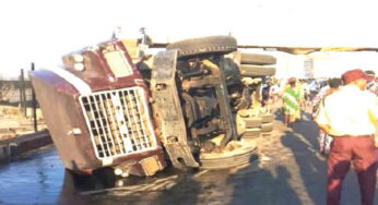 Driver survives after container truck overturns in Lagos